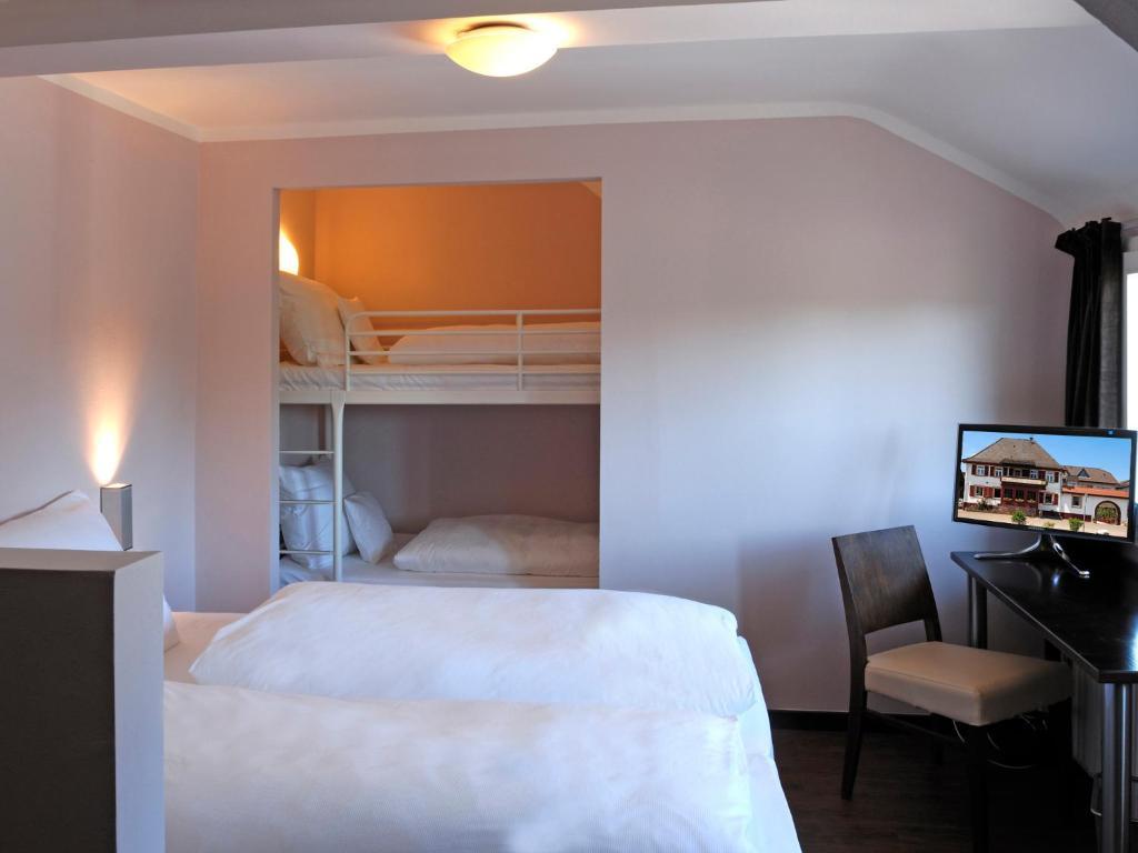 Heckenrose Hotel Ringsheim Camera foto